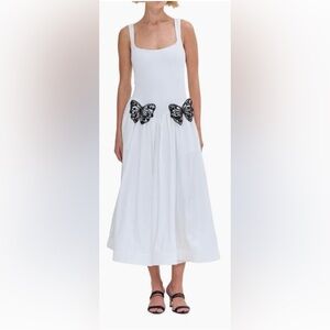 White Dress with Black Butterfly Accents